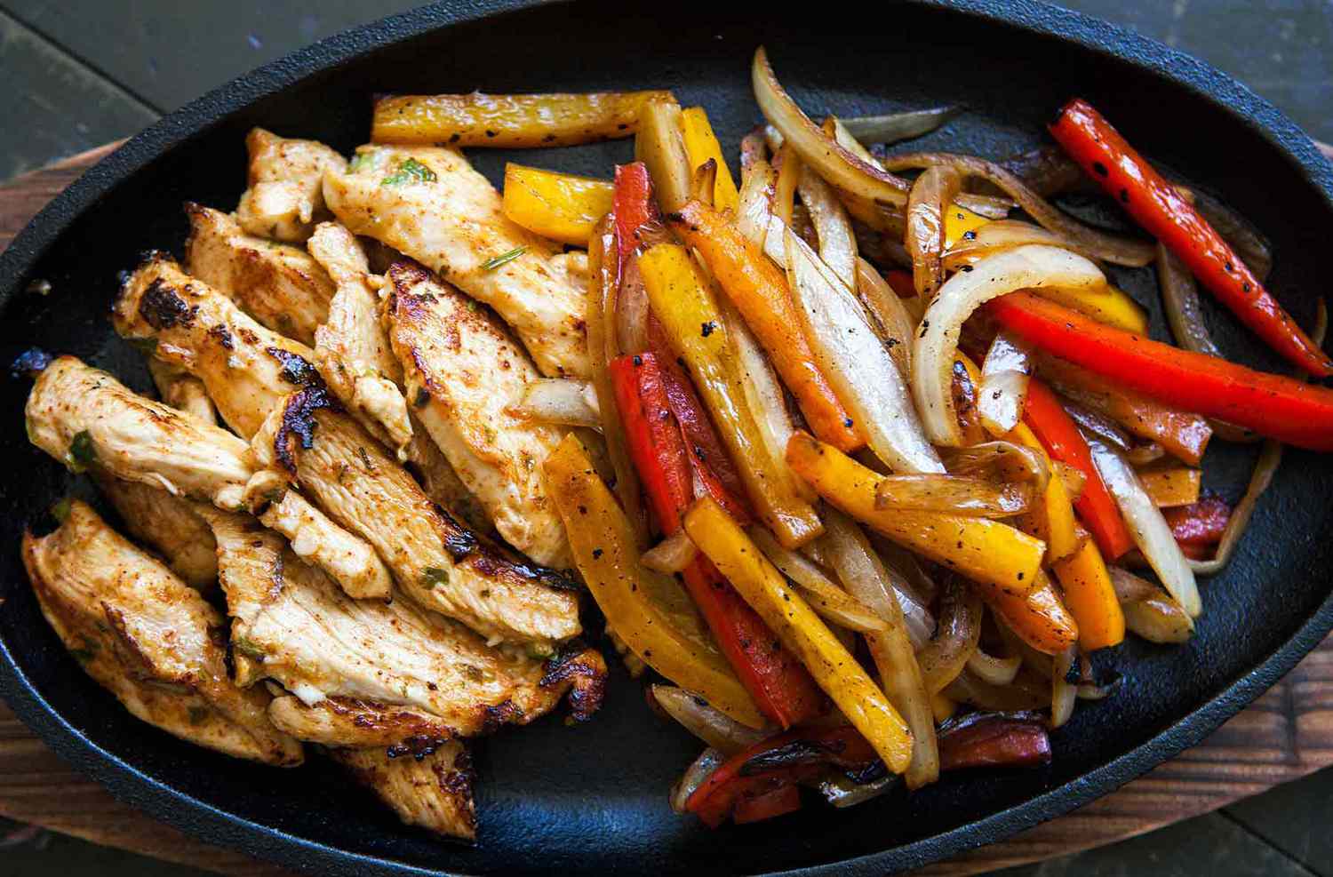 Chicken Fajitas on a cast iron serving skillet