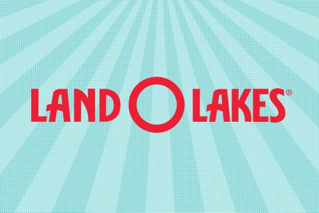 Land OLakes logo with a sunburst background