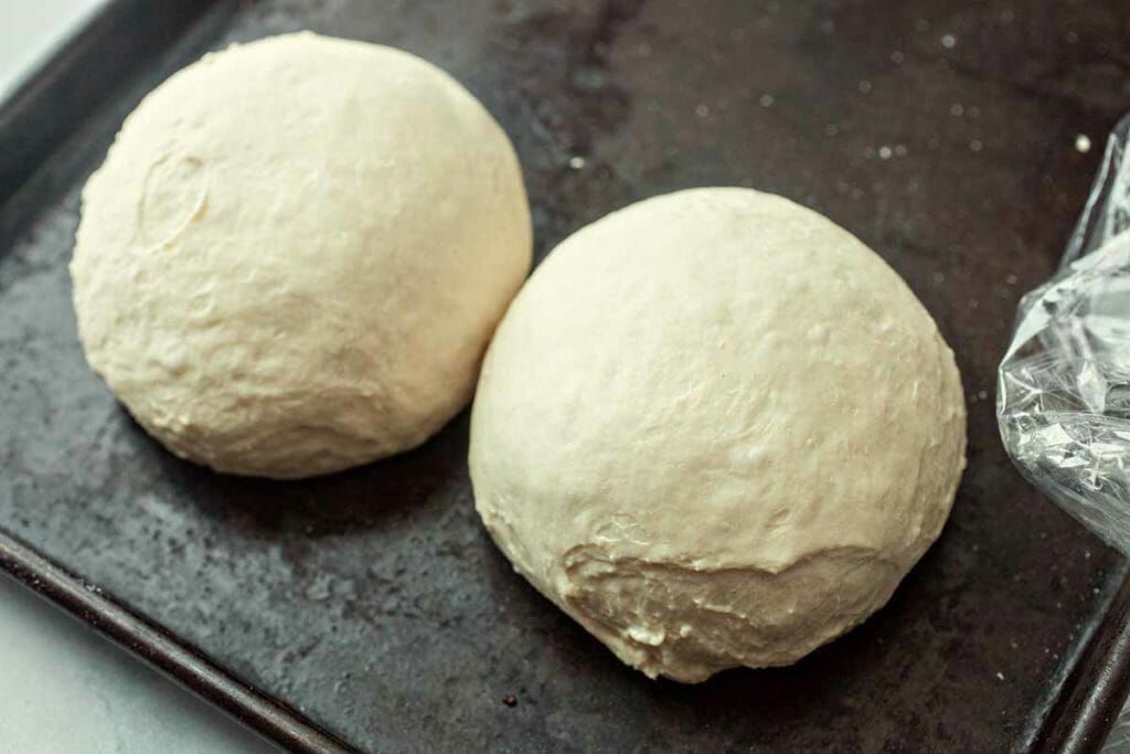 Two balls of homemade pizza dough