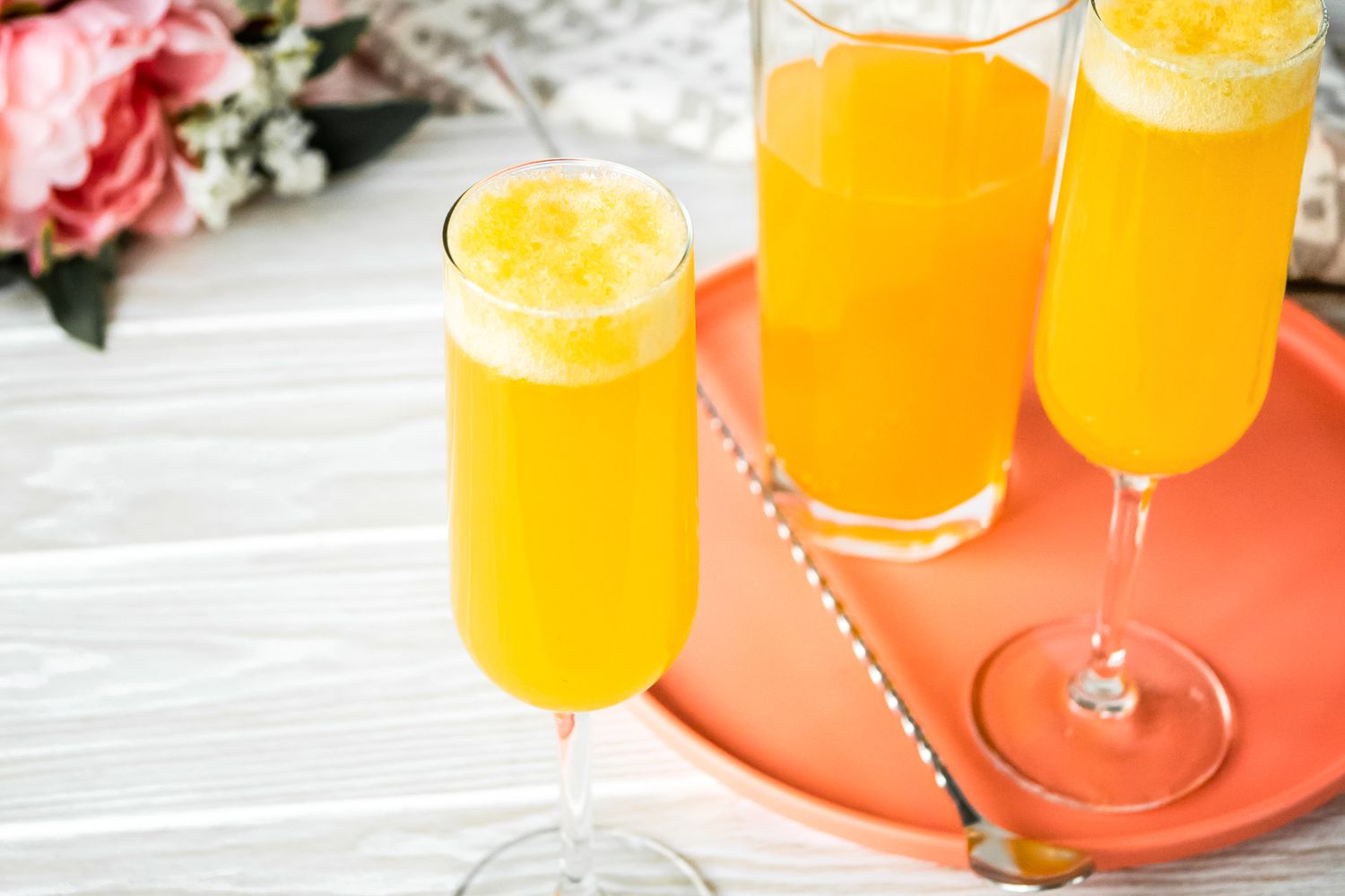 Flutes of Peach Belini Cocktail (Some on a Tray)