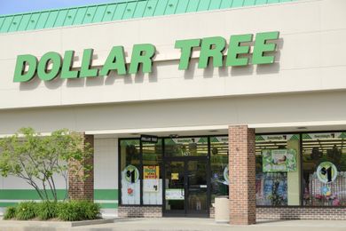 The front entrance of a Dollar Tree store with its logo prominently displayed