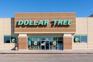 The storefront of a Dollar Tree retail store focusing on its signage and entrance