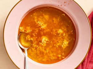Sopa de Ajo in a bowl with a spoon