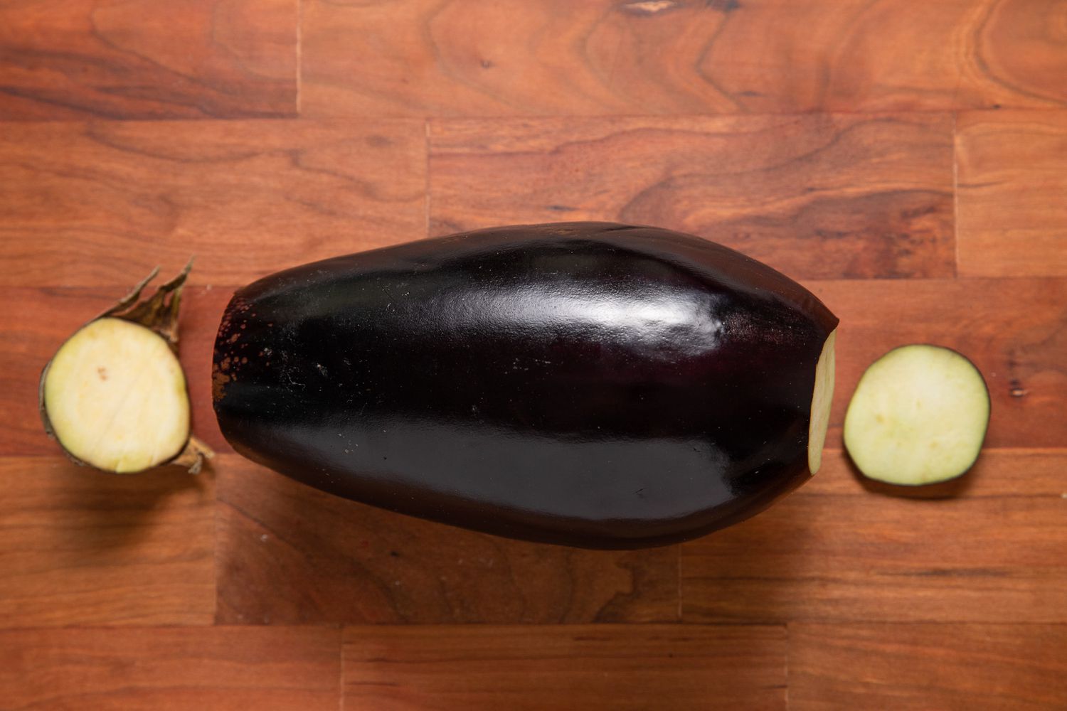 Globe Eggplant With Its Ends Cut for Roasted Eggplant Recipe