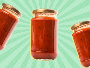 Three jars of marinara sauce with no labels