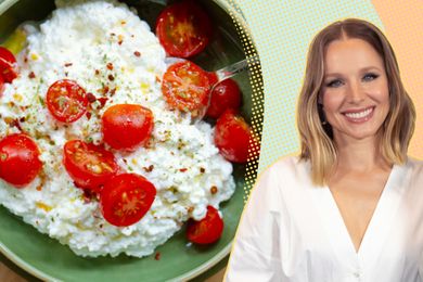 Kristen Bell next to a dish of cottage cheese with cherry tomatoes