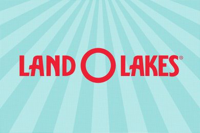 Land OLakes logo with a sunburst background