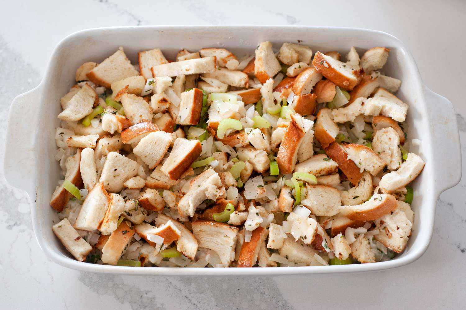 Top casserole with stuffing.