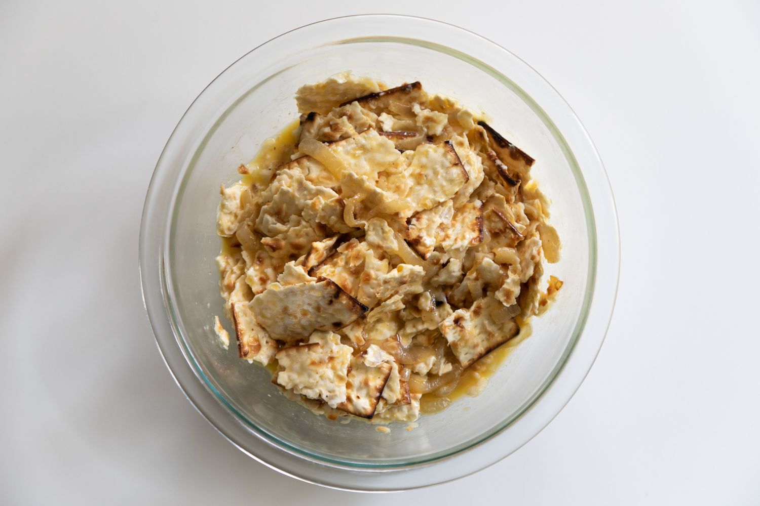 Broken matzo crackers in a bowl.