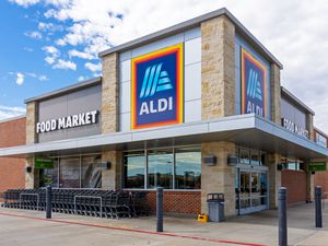 Aldi supermarket exterior with shopping carts near the entrance