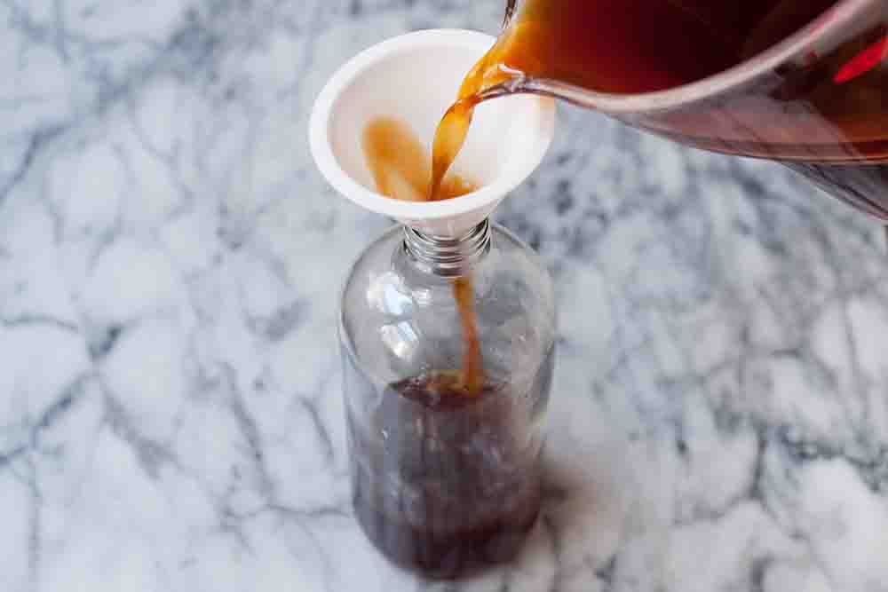 Cold brew being poured into a glass