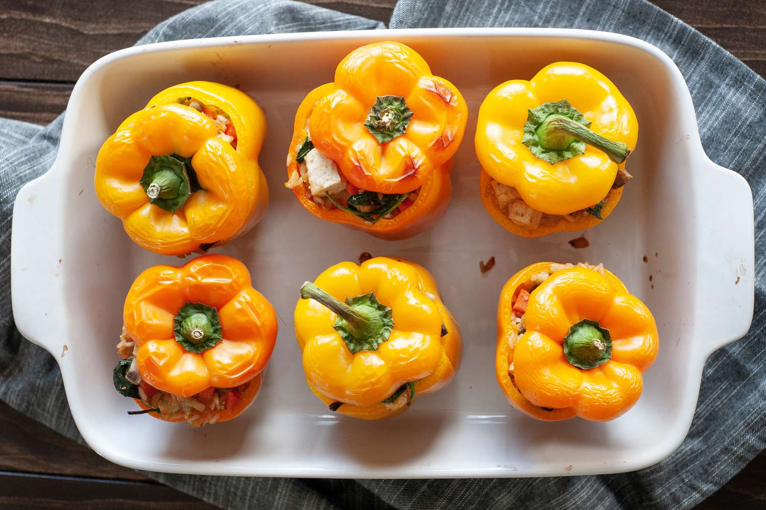 Vegetarian Stuffed Peppers in casserole dish