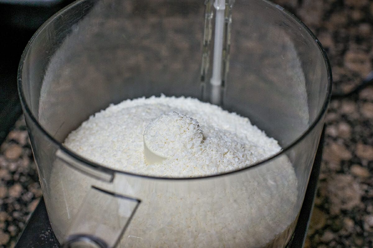 Shredded Coconut in a food processor to make Coconut Macaroons