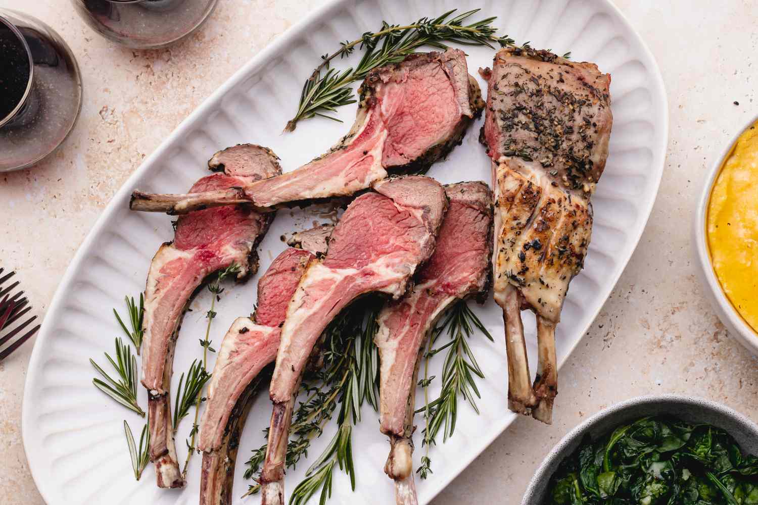 Rack of lamb cut into chops on platter