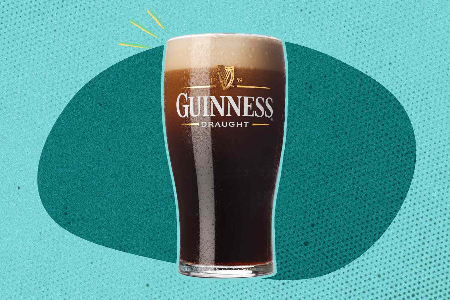 A pint glass of Guinness Draught with foam at the top