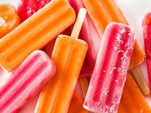 Several popsicles arranged on a surface