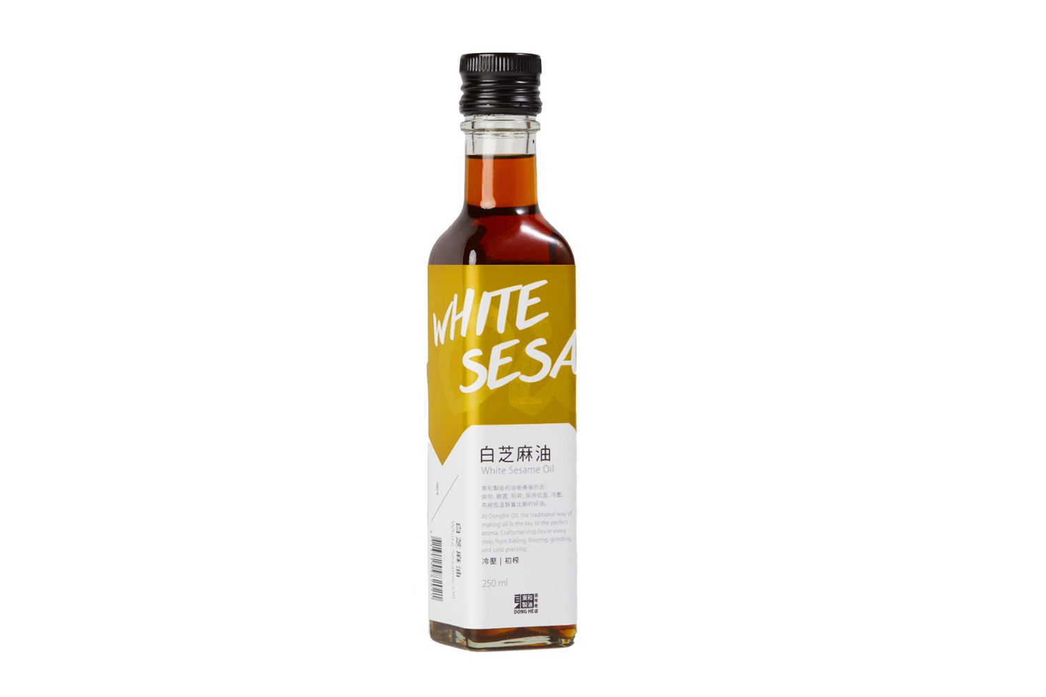 A glass bottle of white sesame oil