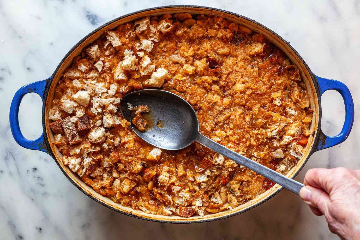 Soak breadcrumb crust into cassoulet. 