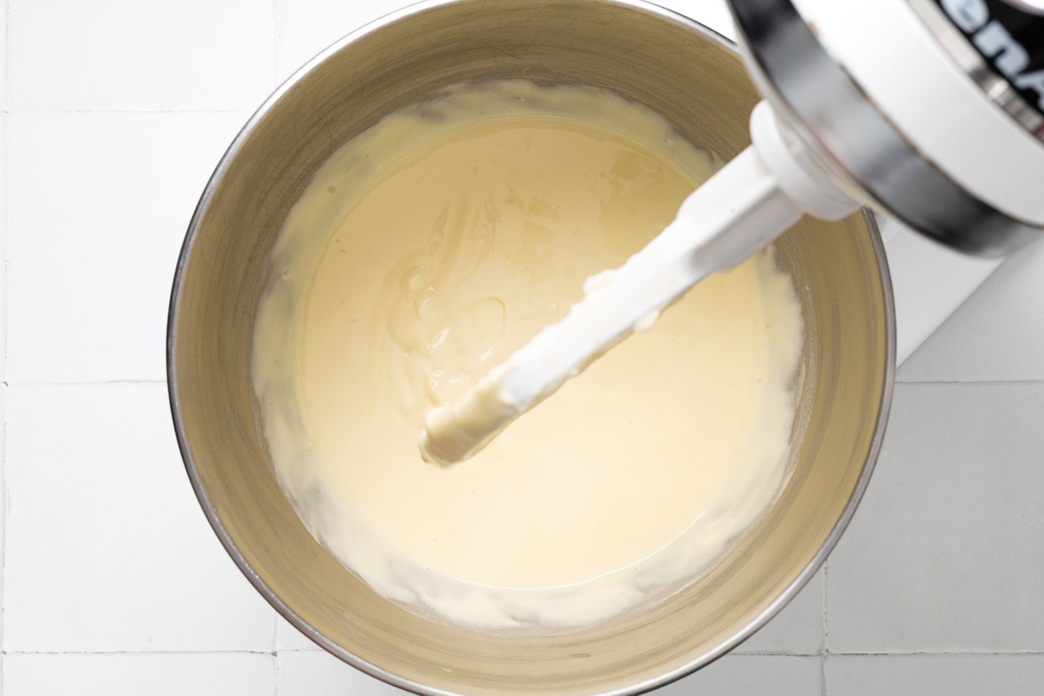 Lemon Cheesecake Bar Filling in a Mixer Bowl on a Stand Mixer 