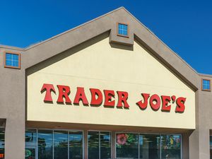 The facade of a Trader Joe's store with a prominent red sign
