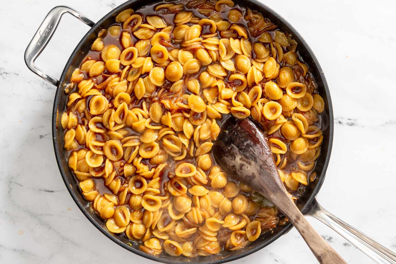 cooked French onion pasta in the pot