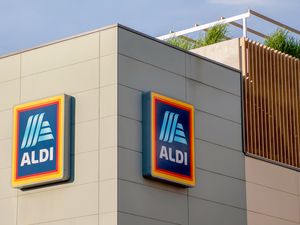 Aldi store sign on a building wall