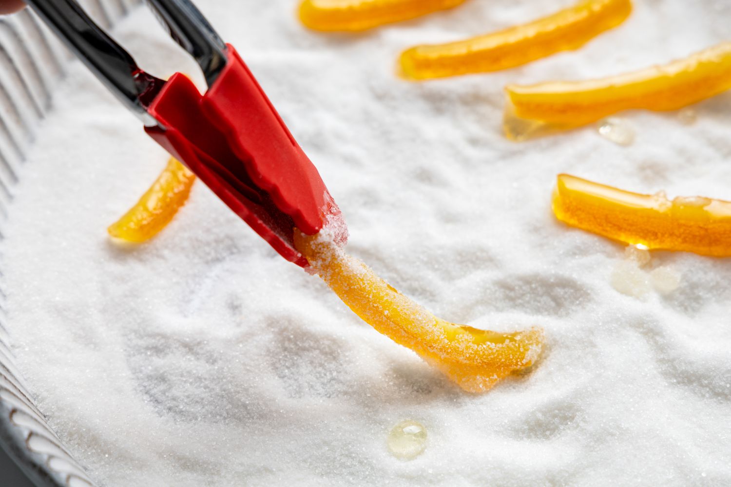 Orange Slices Tossed in a Bowl of Sugar