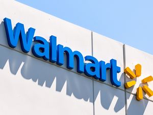 The Walmart logo on the side of a building