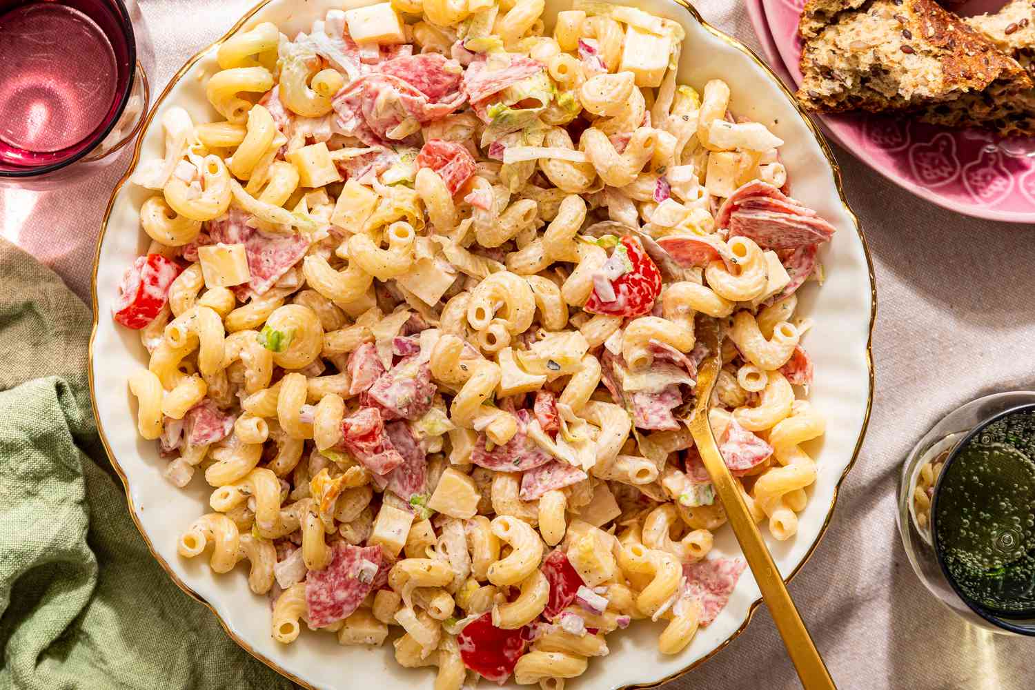 A plate of pasta salad with a fork