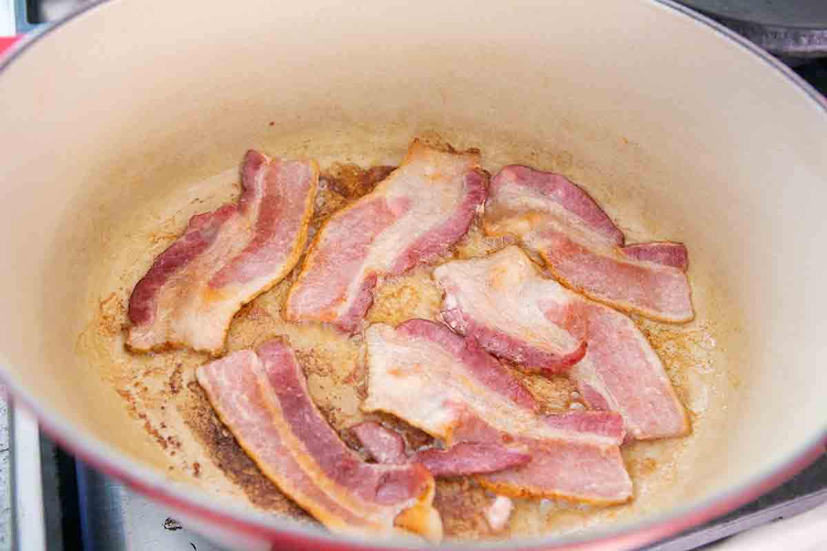 bacon cooking in pot for short rib stew