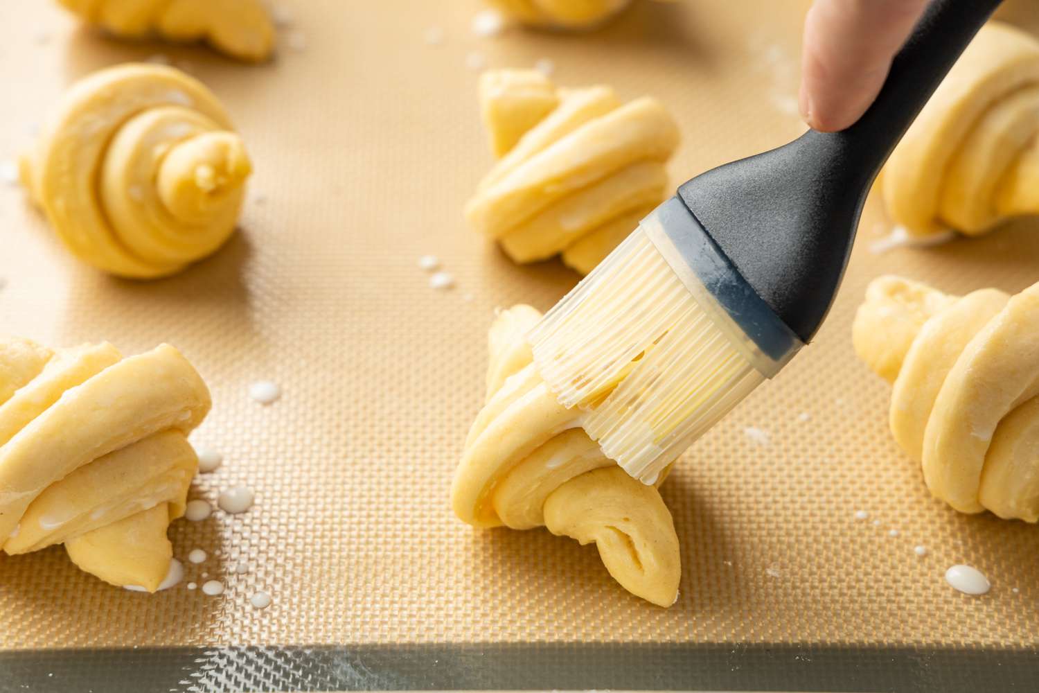 Homemade Crescent Rolls Brushed with Milk