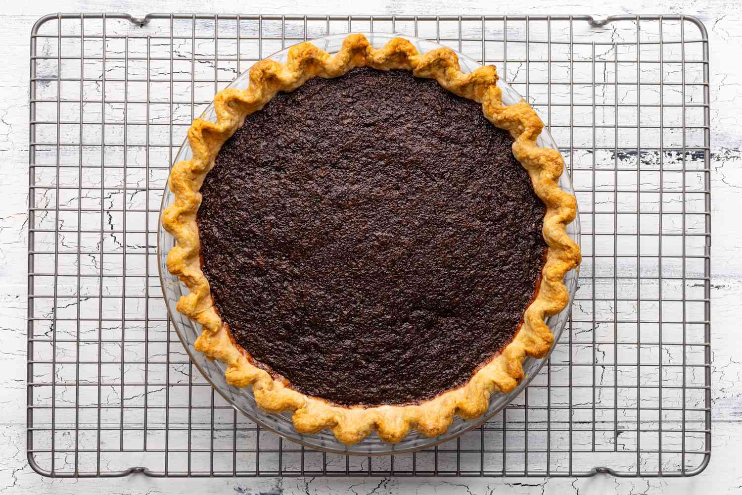 Baked Chocolate Chess Pie in Pie Dish on a Cooling Rack