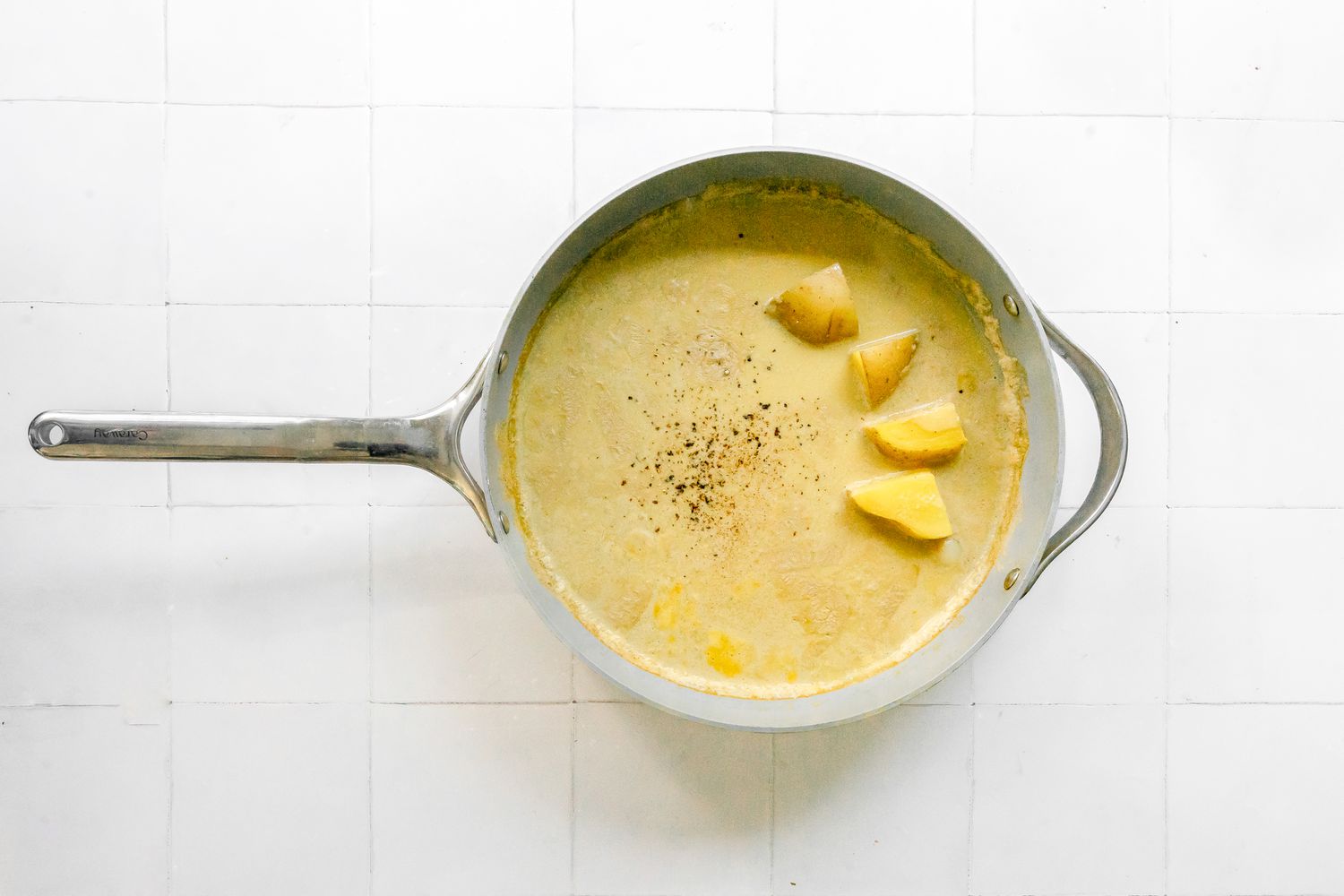 Pot with Sauce Ingredients (Cashews, Potatoes, Nutritional Yeast, Garlic, etc) for Super Creamy Vegan Pasta Recipe