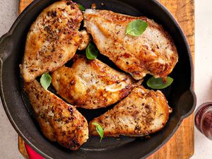 cooked seasoned chicken breast in a cast iron skillet