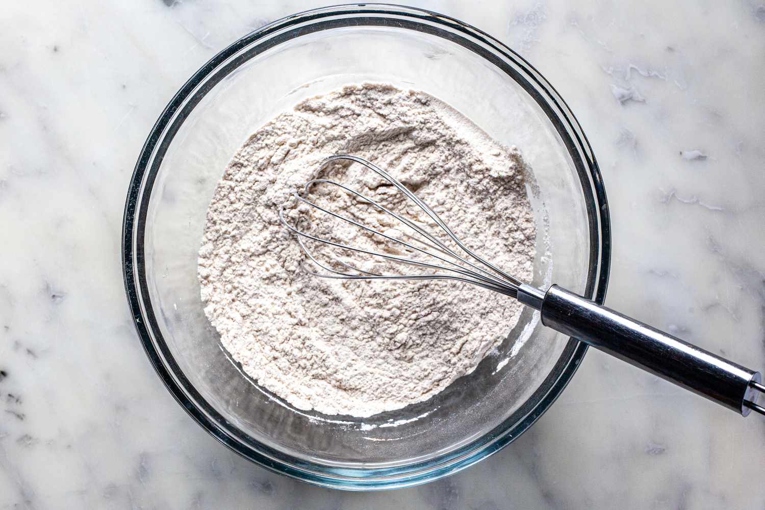 Dry ingredients in a bowl to make a batch of cowboy cookies