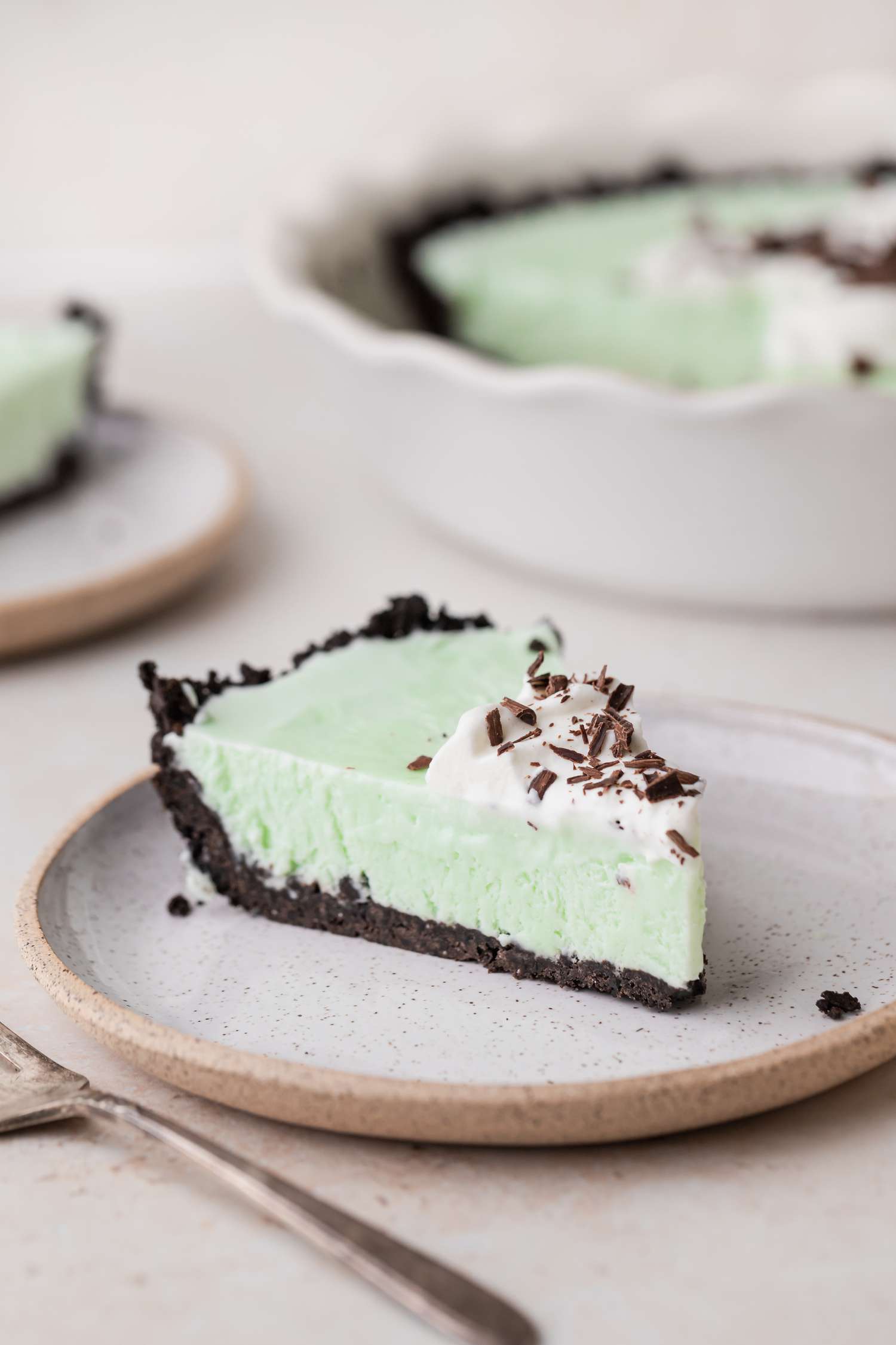 Side view of a slice of grasshopper pie.