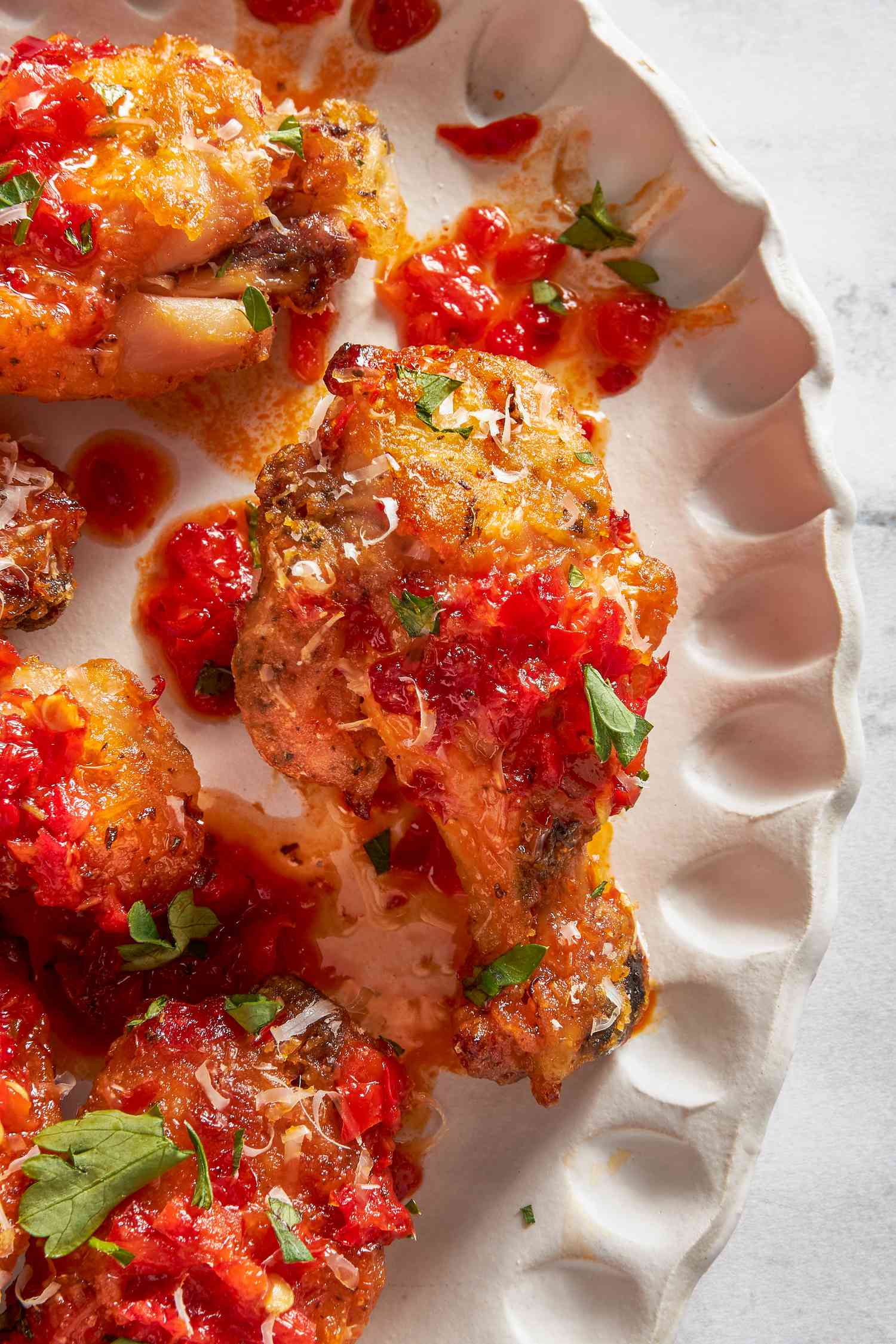 Chicken wing on a white platter