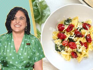 Samin Nosrat portrait next to a bowl of her Pasta with Tomato "Candy"