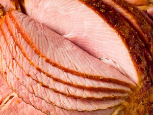 Glazed ham cut into slices