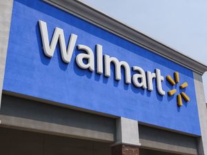 The front signage of a Walmart store featuring the logo and brand name displayed prominently
