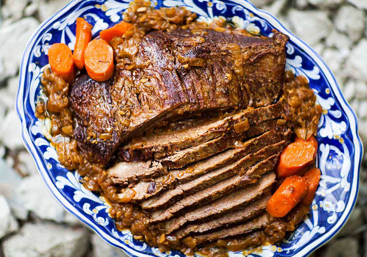 Beef Brisket with carrots on platter