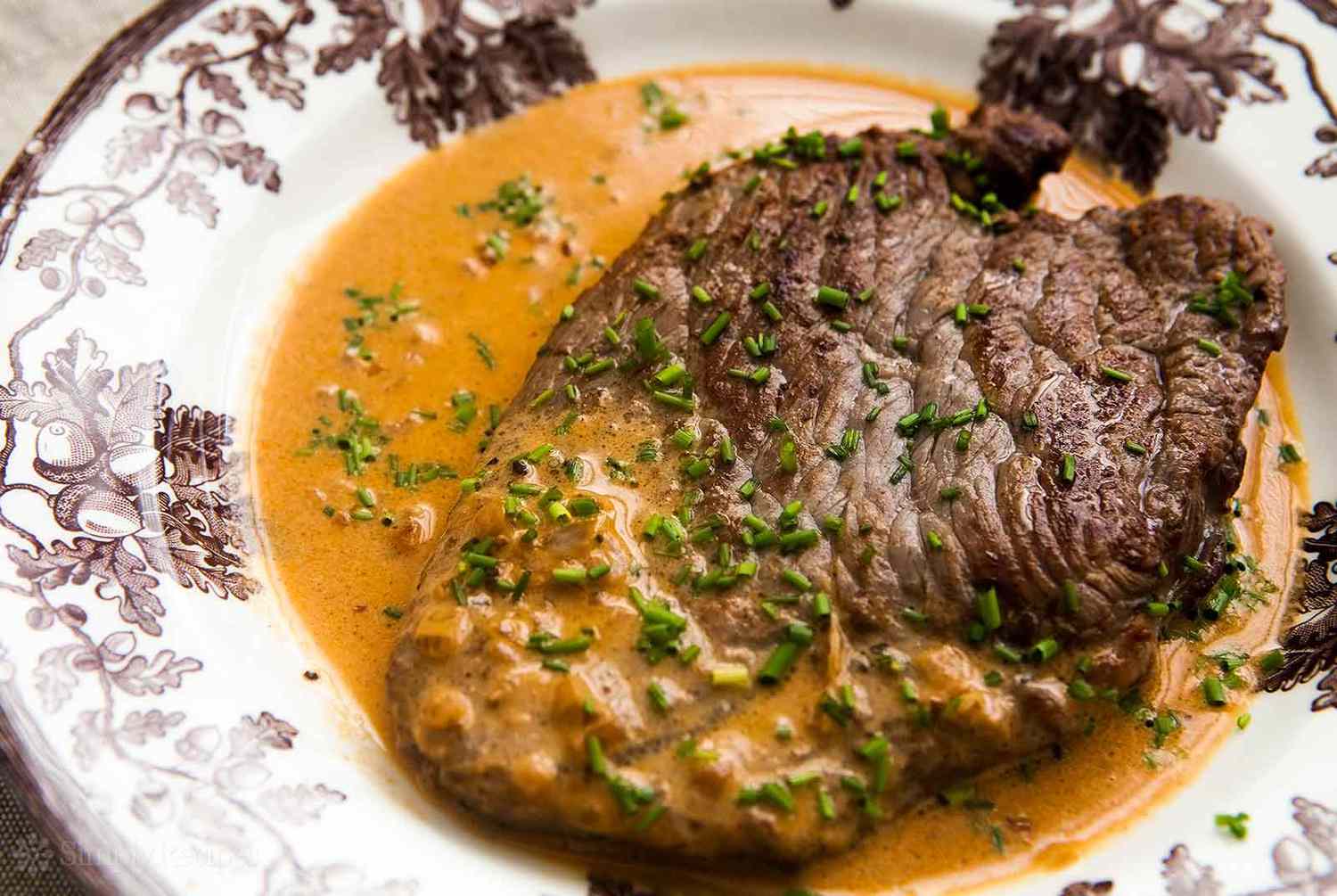 A plate of steak Diane ready to serve and eat
