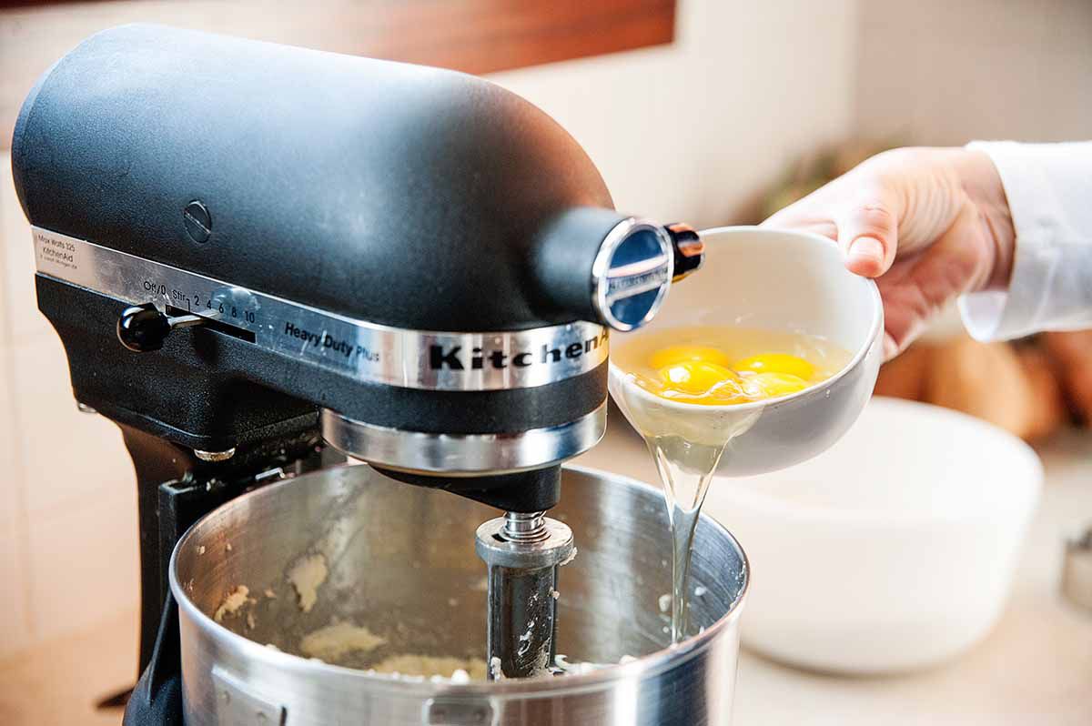 Lemon Pound Cake from Scratch - adding eggs to stand mixer
