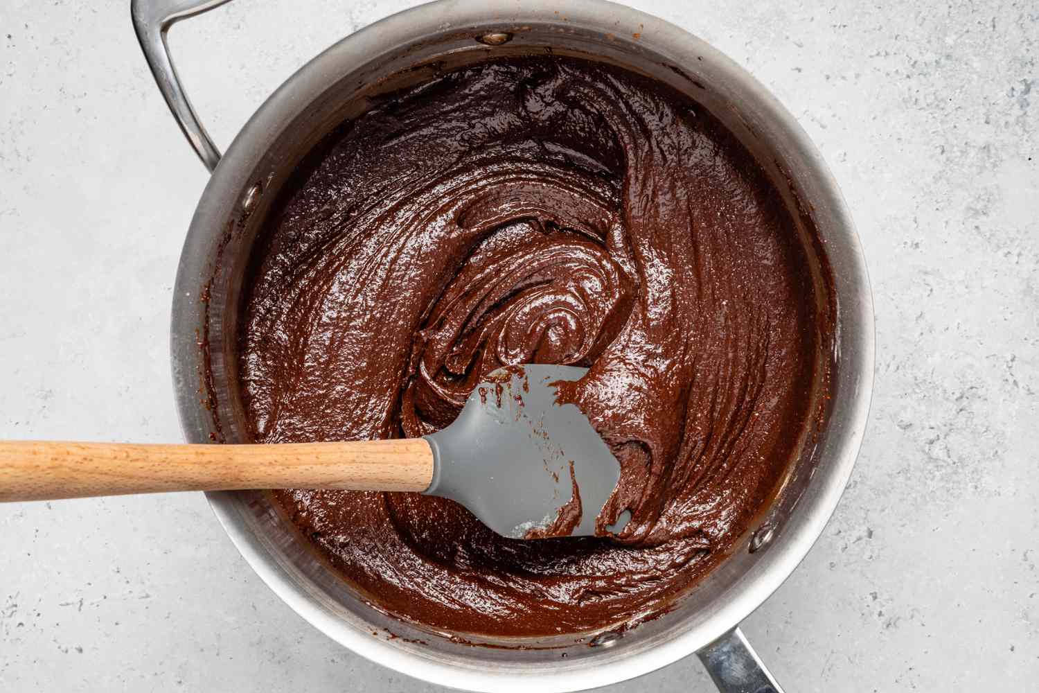 Brownie Mixture Folded Together Using a Spatula for Chocolate Brownie Banana Bread Recipe