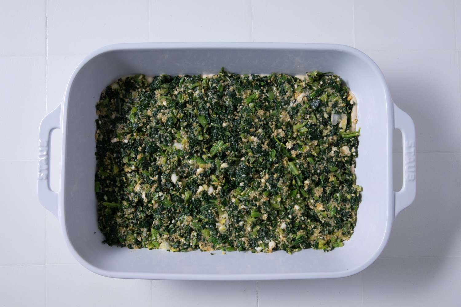 batsaria filling added to casserole dish
