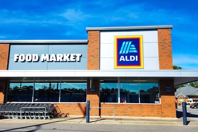 Exterior of an Aldi grocery store with the logo and signage displayed on the front