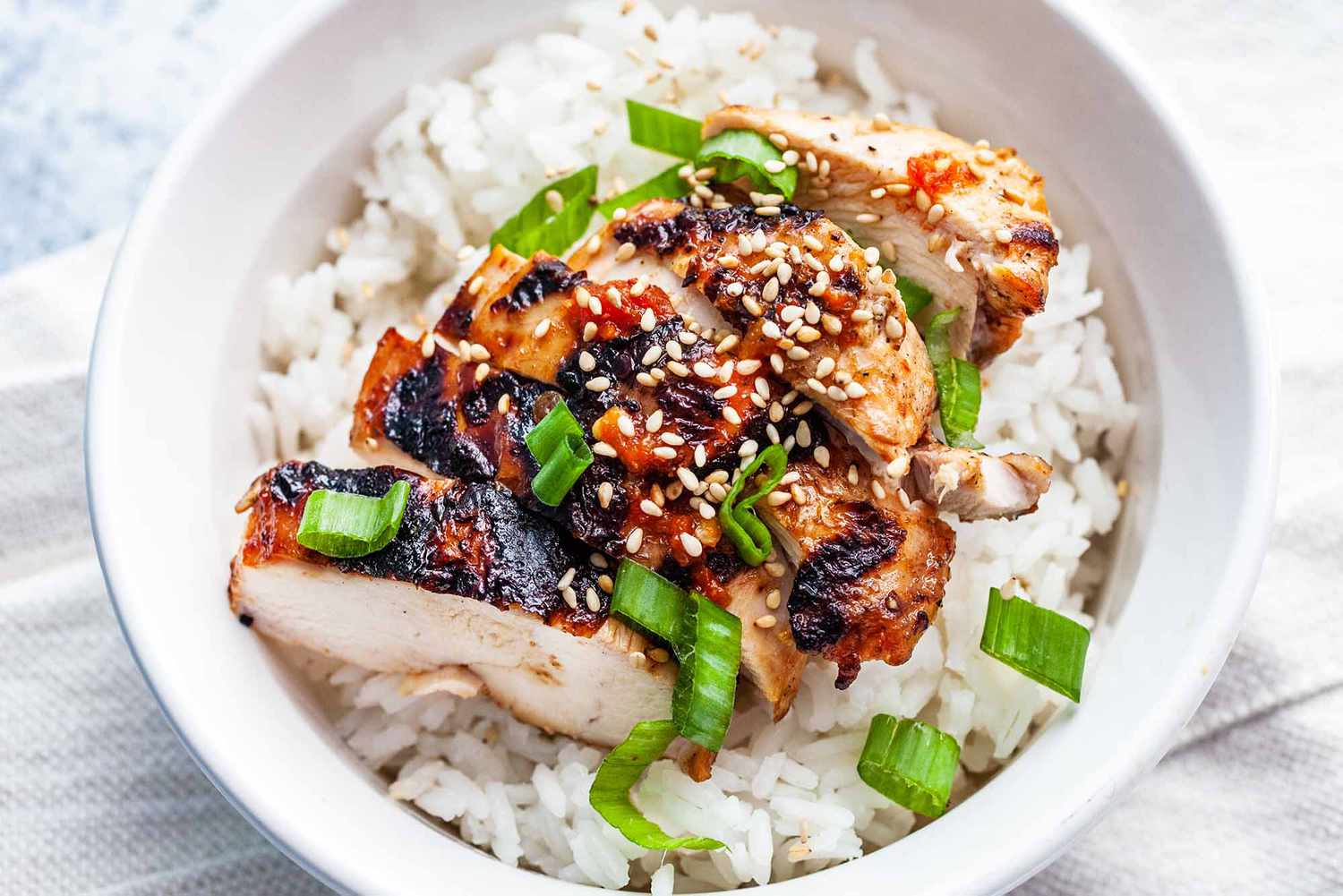 Grilled Chicken with Chili Garlic Sauce garnish and serve