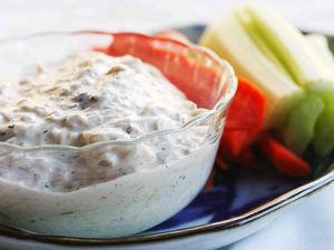 Crab Dip in bowl with veggies on the side