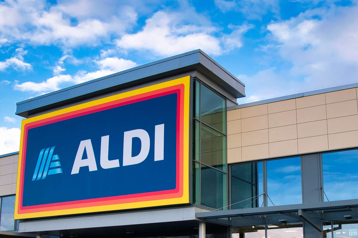 Aldi storefront with its logo visible on the sign