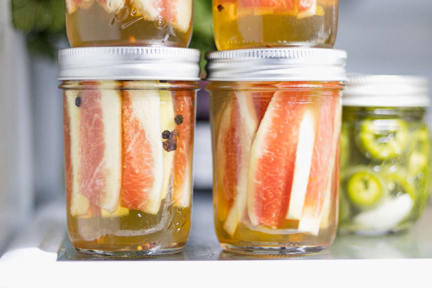 Pickled Watermelon Rinds in Jars in the Refrigerator